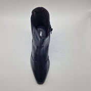 BOTÍN CON ELÁSTICO Y TACHAS EN PIEL NEGRA