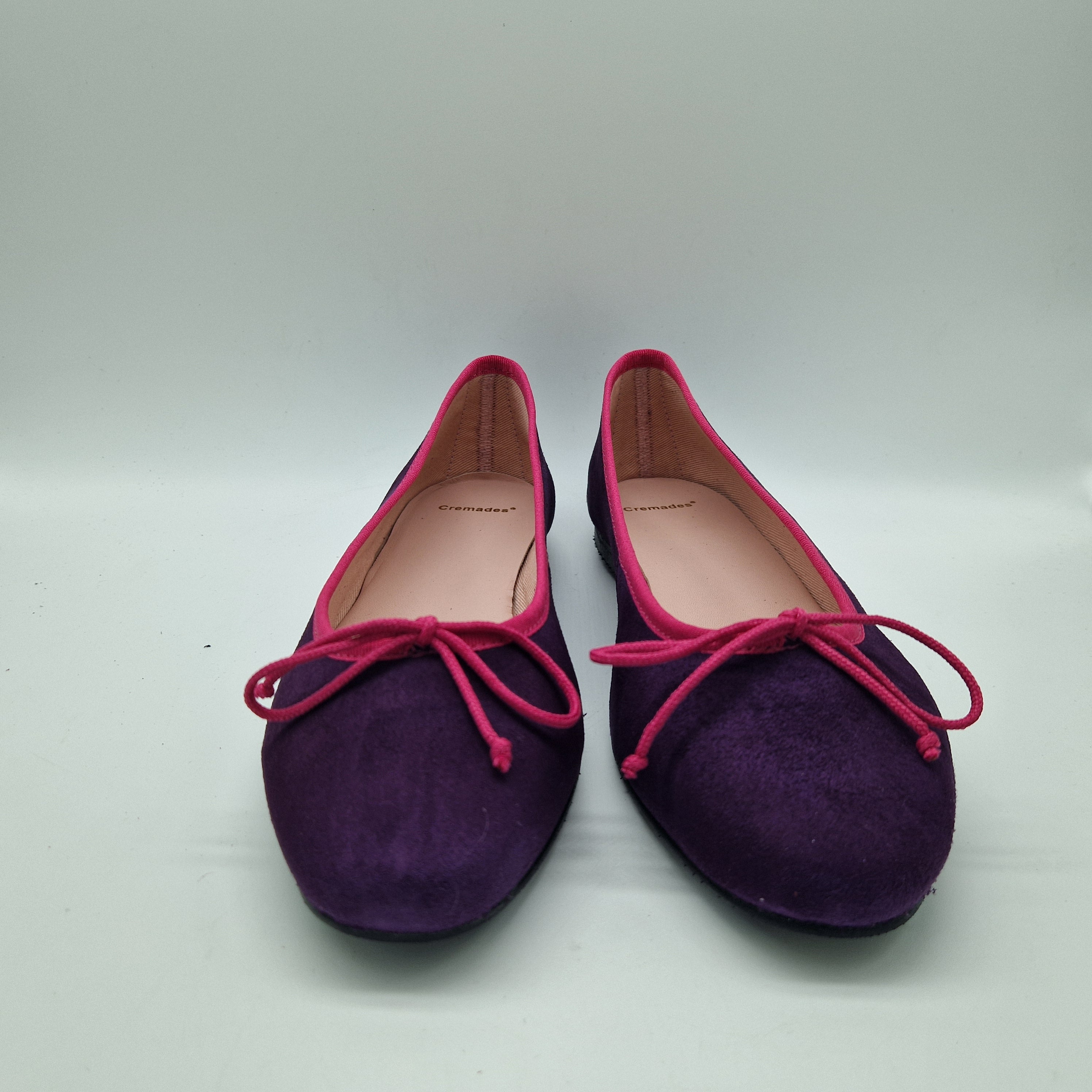 BAILARINA EN ANTE MORADO Y LAZO FUXIA