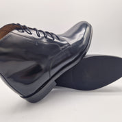 BOTÍN LISO EN PIEL NEGRA