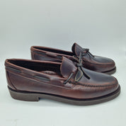 Mocasines CATELLANO de lazo en piel marrón de Mocasines 1901, con detalles de botones y diseño clásico.