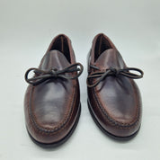 Mocasines marrón de lazo en piel de la marca Mocasines 1901, con diseño elegante y detalles en la parte superior.