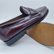 Mocasines de piel burdeos de la marca Mocasines 1901, estilo clásico y elegante para mujer.