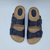 Sandalias 2 hebillas en marrón de INTERBIOS, calzado cómodo y elegante para mujer, con diseño de tiras y hebillas ajustables.