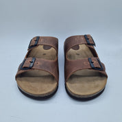 Sandalias de cuero con dos hebillas de la marca INTERBIOS, diseño cómodo y elegante para uso diario.
