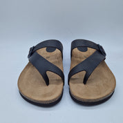 Sandalias de dedo marrón de la marca INTERBIOS, con diseño cómodo y casual, visibles en la imagen.