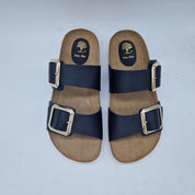 Sandalias negras de dos hebillas de la marca INTERBIOS, con tiras ajustables y suela cómoda para uso diario.