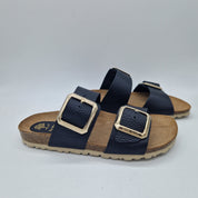 Sandalias de dos hebillas negras de la marca INTERBIOS, con tiras ajustables y diseño cómodo para uso diario.