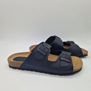 Sandalias negras de dos hebillas de la marca INTERBIOS, cómodas y elegantes para uso diario.